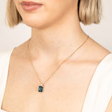 9ct Gold 5.6ct London Blue Topaz in Emerald Cut and 1/10 Carat Diamond Pendant