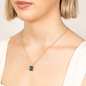 9ct Gold 5.6ct London Blue Topaz in Emerald Cut and 1/10 Carat Diamond Pendant