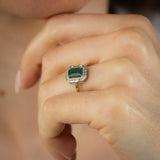 Natural Emerald and Diamond Halo Ring in 9ct Yellow Gold