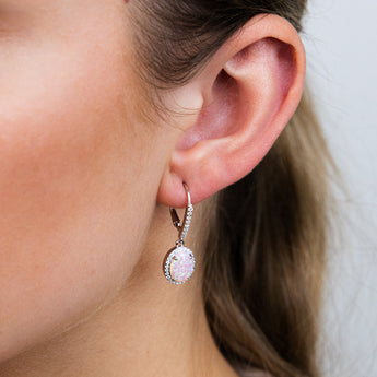 Sterling Silver Rhodium Plated Cubic Zirconia Created Pink Opal Oval Drop Earrings