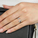 Sterling Silver Rhodium Plated White Shell Pearl Twisted Dolphin Tail Ring