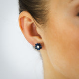 Sterling Silver Rhodium Plated White And Sapphire Blue Cubic Zirconia Flower Stud Earrings