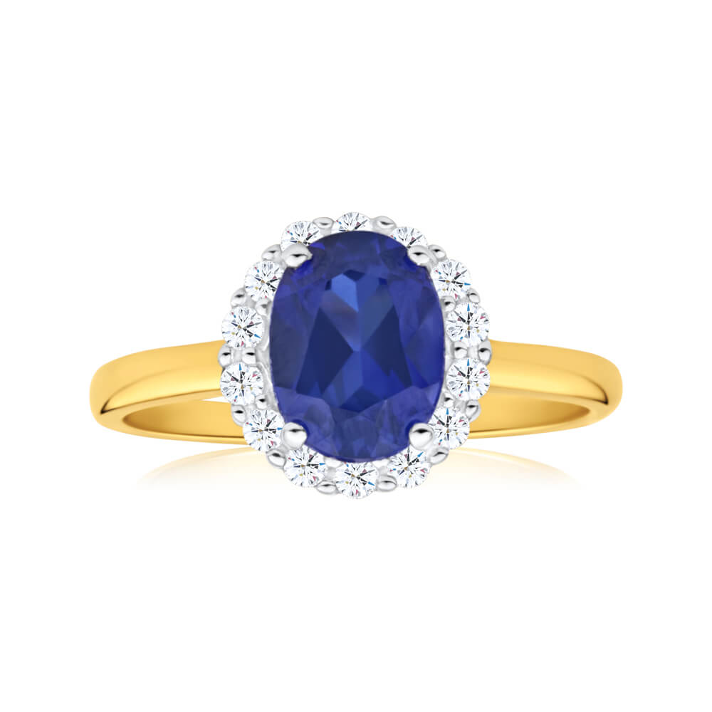 9ct Yellow Gold 8x6mm Oval Created Sapphire and Cubic Zirconia Halo Ring
