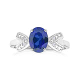 9ct White Gold Oval Created Sapphire + Diamond Ring