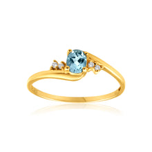 Load image into Gallery viewer, 9ct Yellow Gold Blue Topaz + 4 Cubic Zirconia Ring