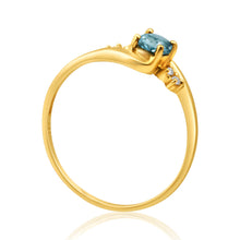 Load image into Gallery viewer, 9ct Yellow Gold Blue Topaz + 4 Cubic Zirconia Ring