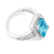 Load image into Gallery viewer, Sterling Silver Sky Blue Zirconia Emerald Cut Ring